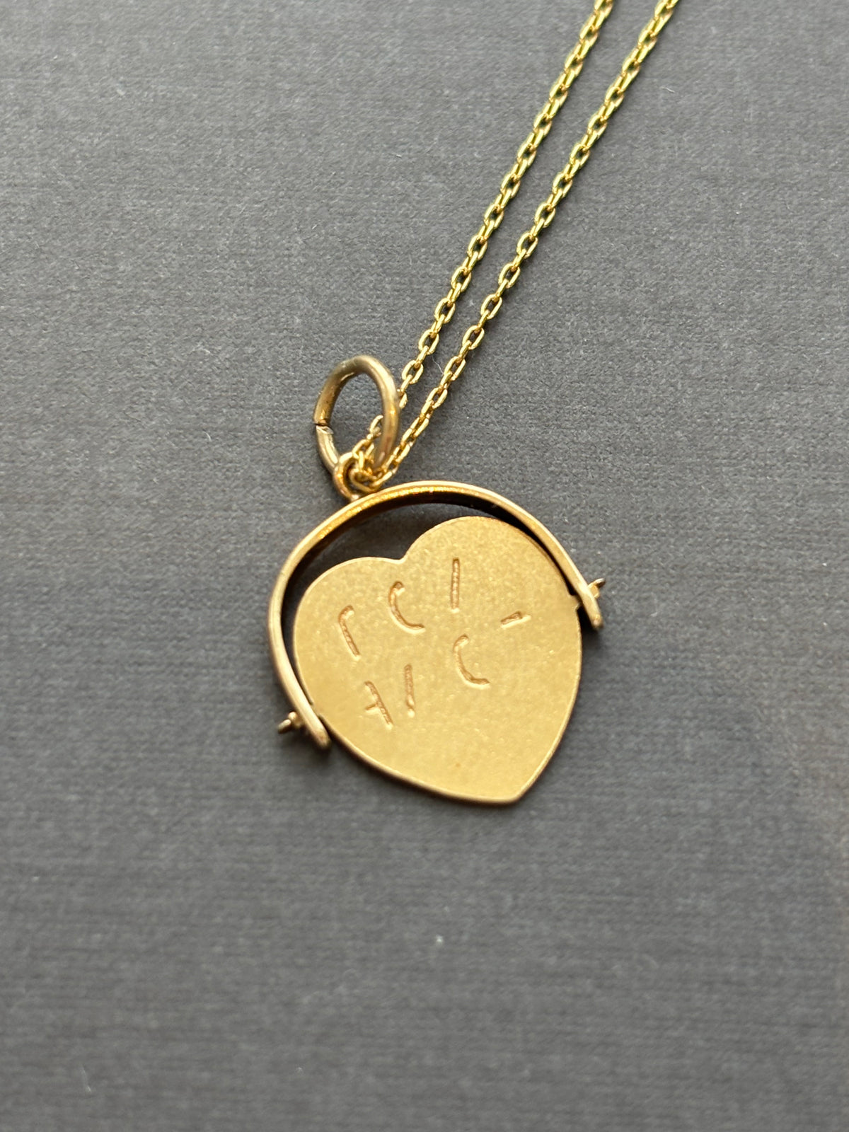 Vintage 9k Gold Heart Spinner Charm
